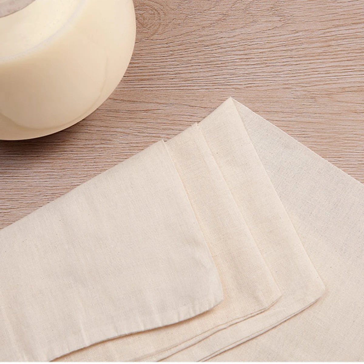 Organic unbleached cheesecloth, soft, durable, and multi-purpose, ideal for cheese making, cooking, and cleaning.