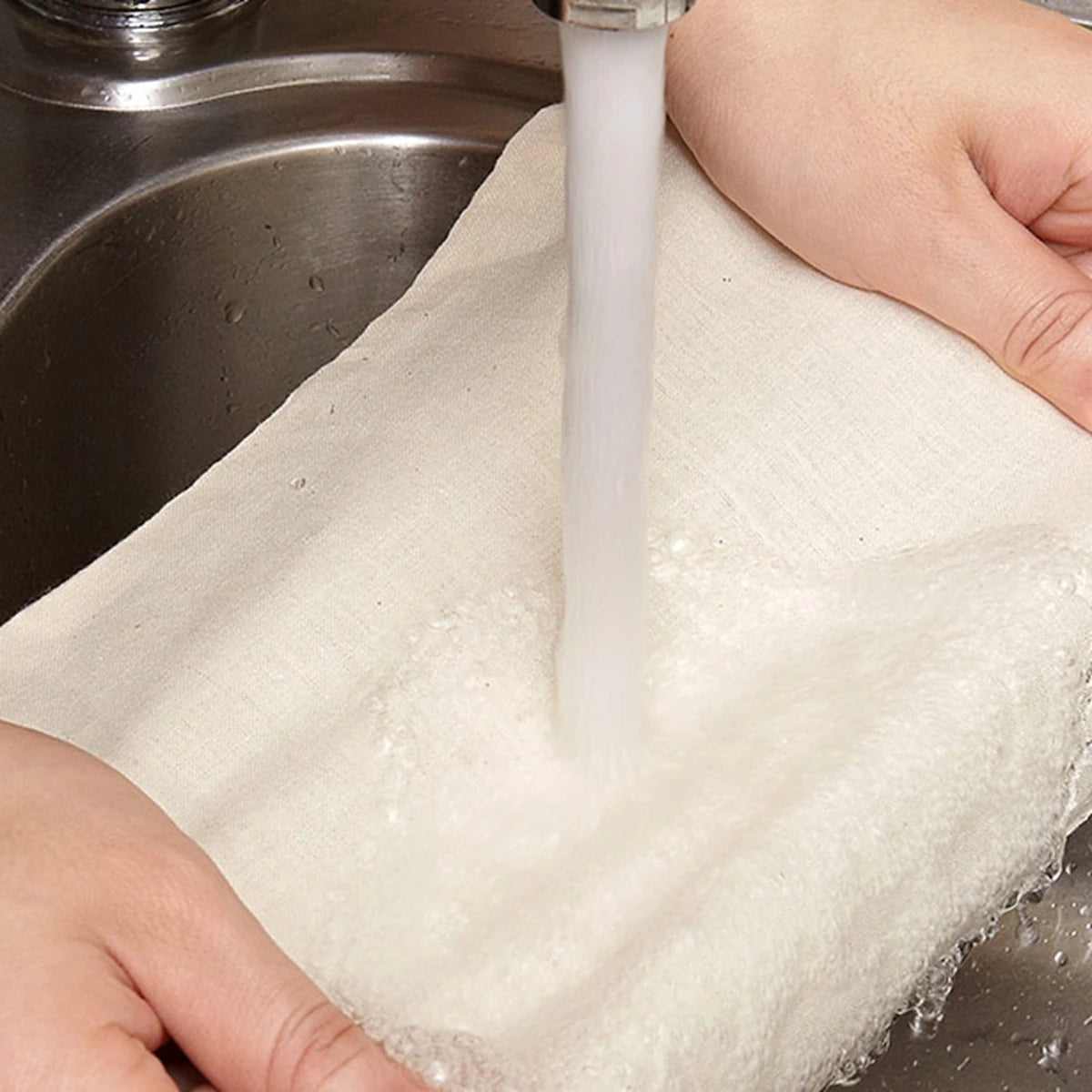 Close-up view of organic unbleached cheesecloth, showcasing its fine weave and natural fibers